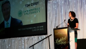 Melanie Cost delivers a moving introduction of her father, Tim, at the First Coast Business Hall of Fame luncheon.