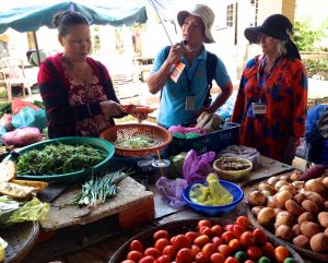 An escorted tour with a native guide is helpful in countries such as Vietnam where English is not commonly spoken. Photo by Dennis Stouse