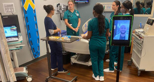 Nursing students train with telehealth robots.